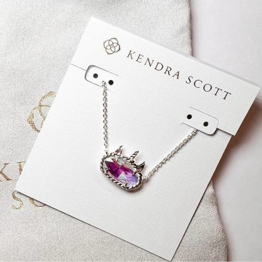 Like new Kendra Scott silver unicorn necklace. Dichroic glass